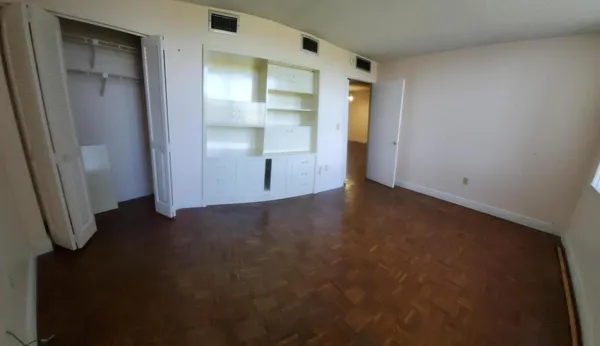 an empty room with windows