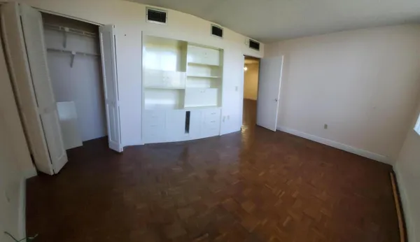 an empty room with windows