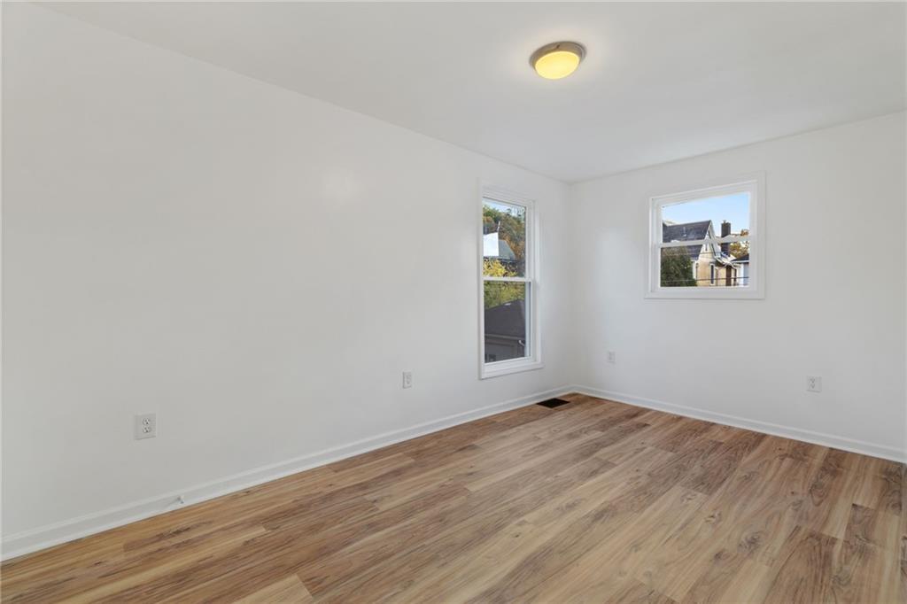 607 Murray Street Sewickley, PA 15143 - Photo 14 of 25 The bedroom sits adjacent to the living room. Both rooms have spacious closets.