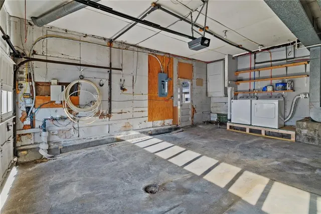 a utility room with washer and dryer
