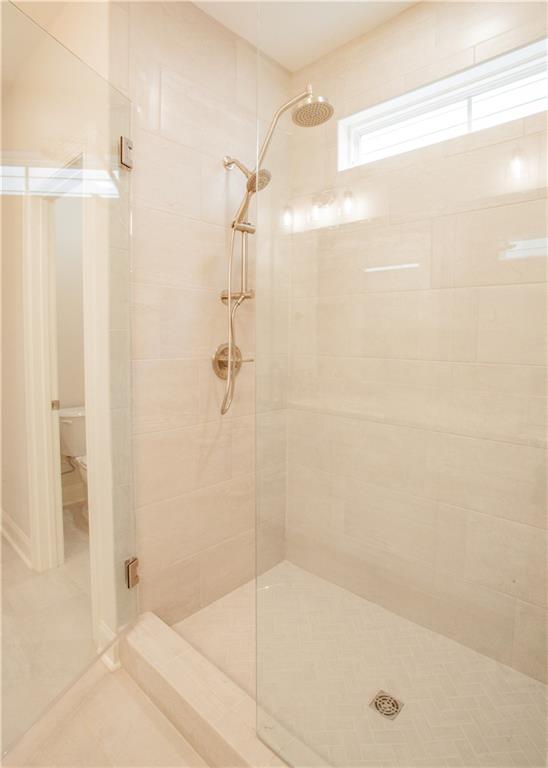 388 Maple View Drive Carrollton, GA 30117 - Photo 12 of 18 a bathroom with a shower