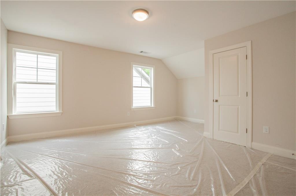 388 Maple View Drive Carrollton, GA 30117 - Photo 16 of 18 a view of an empty room with a window