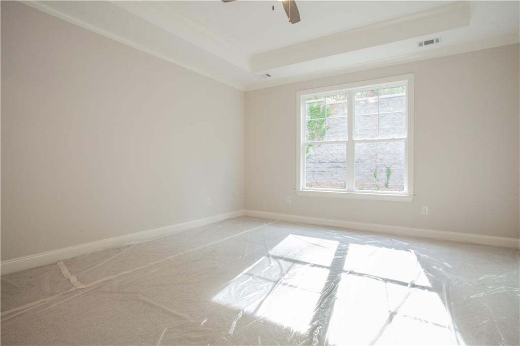 388 Maple View Drive Carrollton, GA 30117 - Photo 8 of 18 an empty room with windows