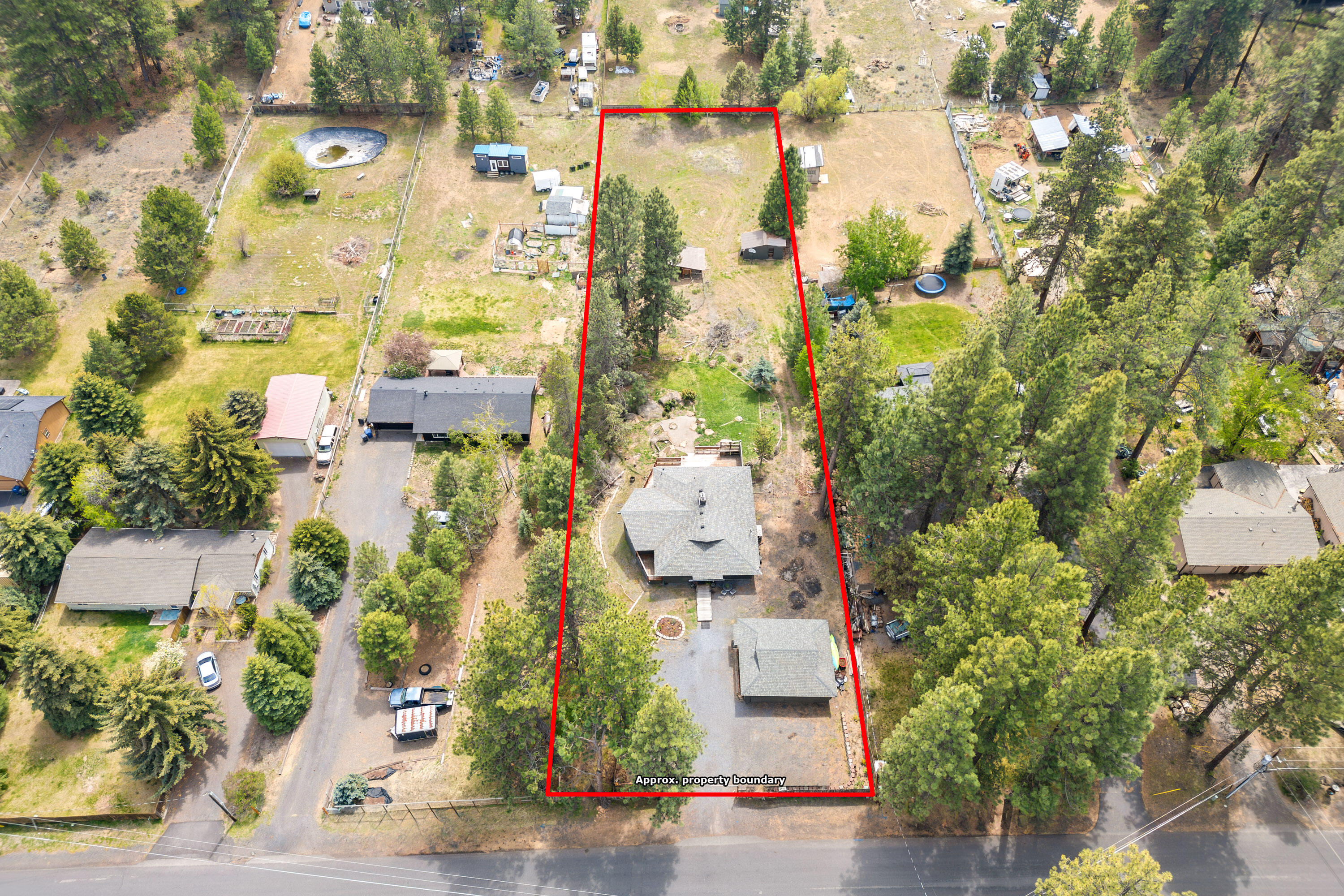 19143 Pumice Butte Road Bend, OR 97702 - Photo 17 of 19 an aerial view of residential houses with outdoor space
