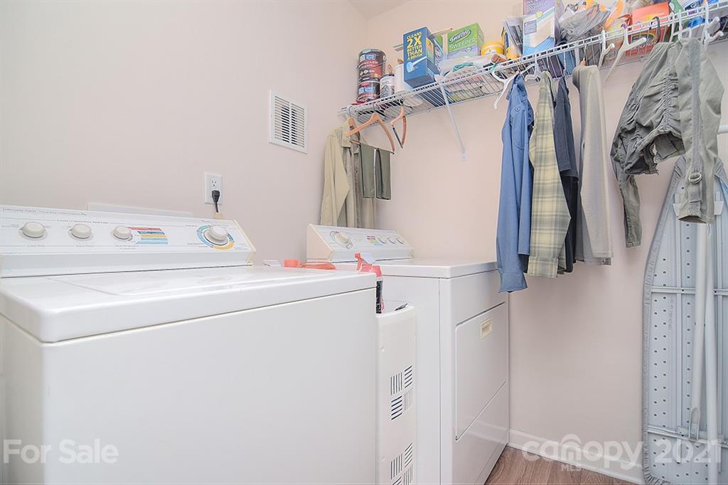 607 Hunley Street Monroe, NC 28112 - Photo 14 of 29 a utility room with dryer and washer