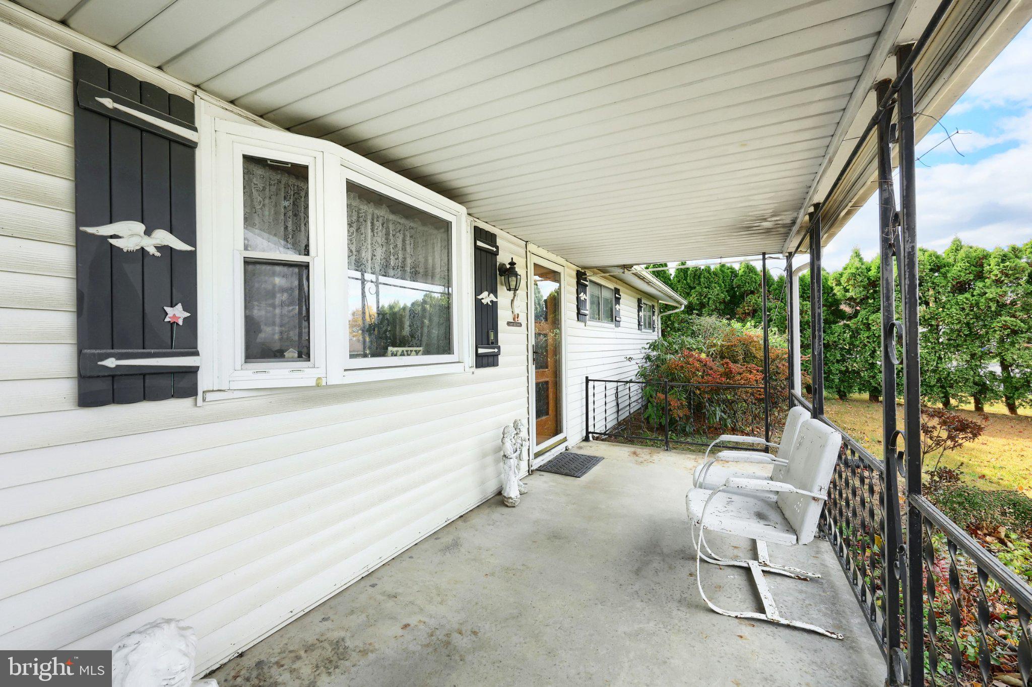3120 Robin Road York, PA 17404 - Photo 10 of 24 Charming porch with inviting views.