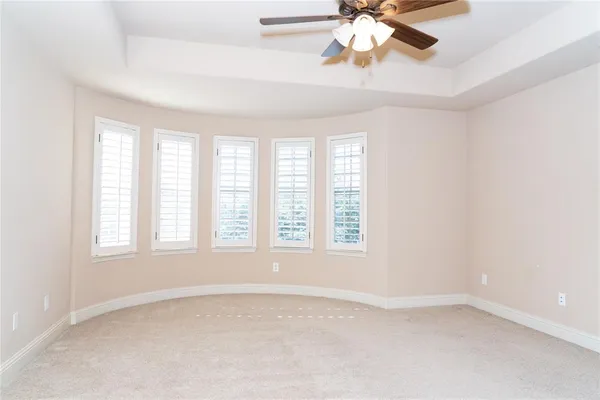 wooden floor in a room with a window