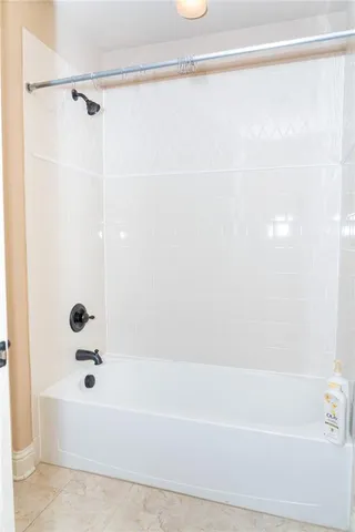 a view of a backyard with a patio