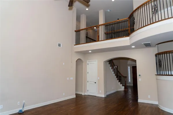 a view of entryway with wooden floor