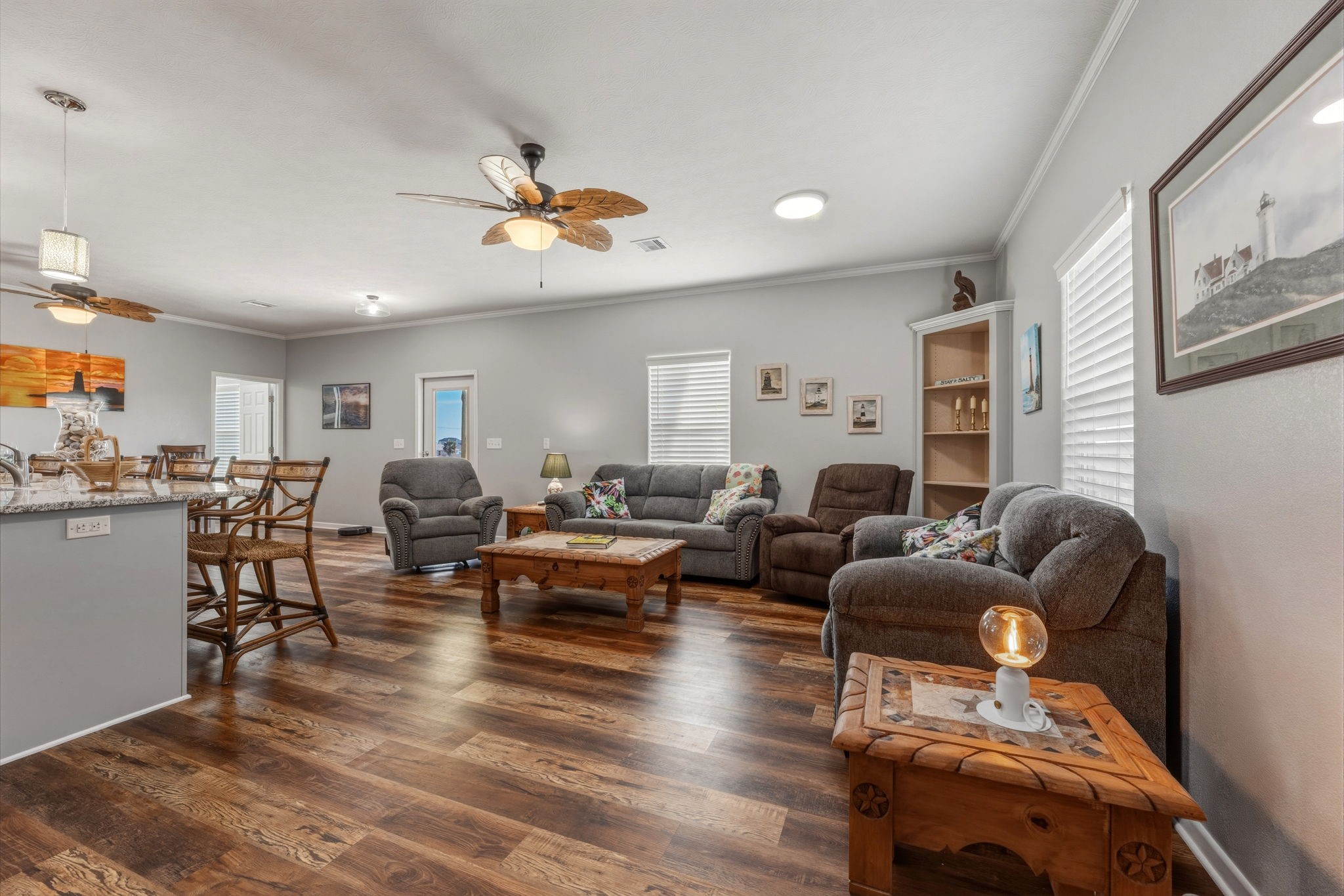 920 Palm View Crystal Beach, TX 77650 - Photo 14 of 26 a living room with furniture kitchen view and a window