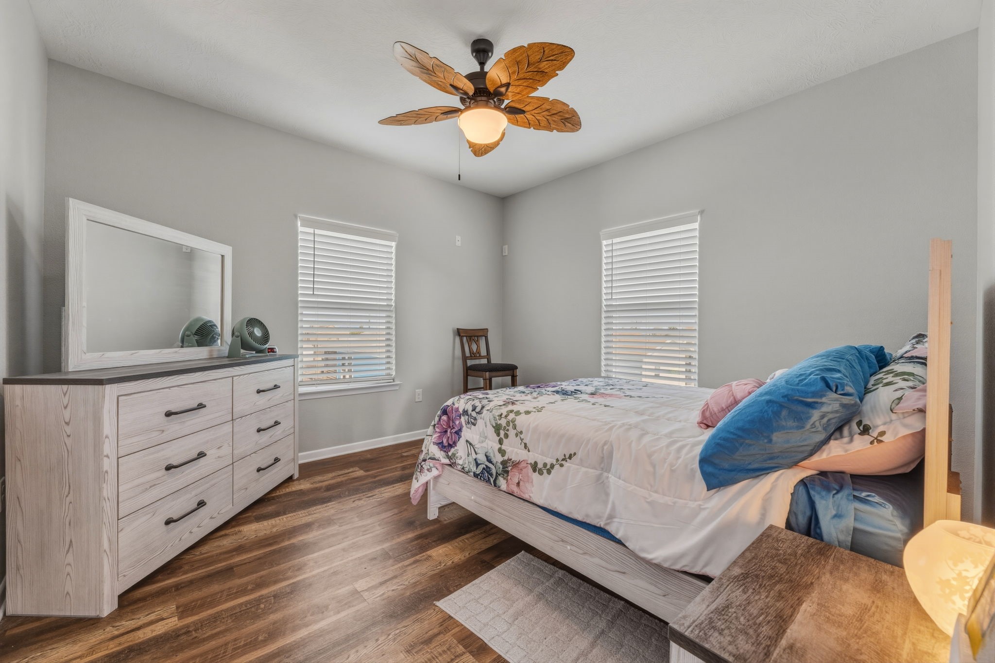 920 Palm View Crystal Beach, TX 77650 - Photo 16 of 26 a bedroom with a bed and a dresser