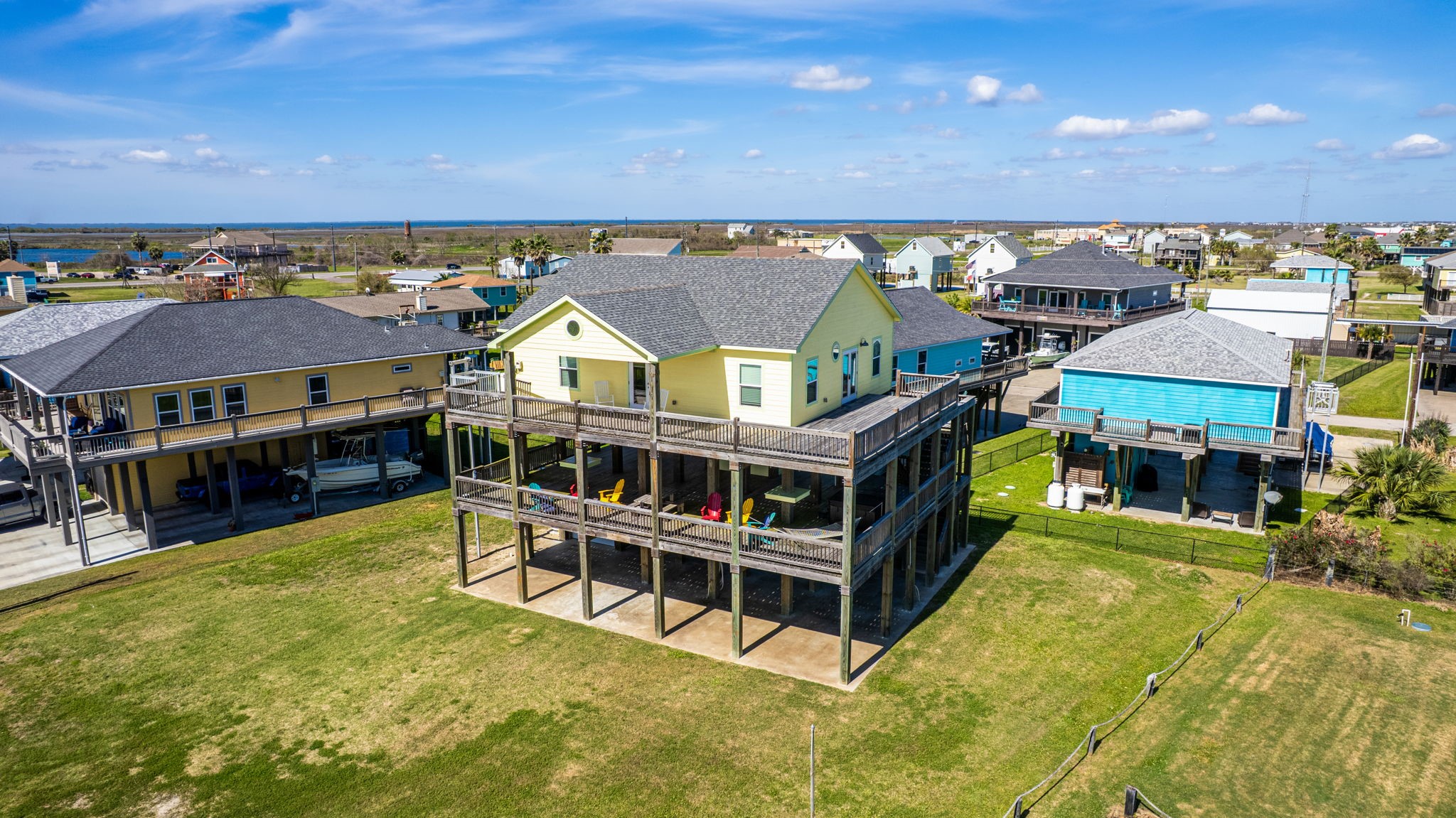 920 Palm View Crystal Beach, TX 77650 - Photo 2 of 26 a view of a swimming pool with seating area