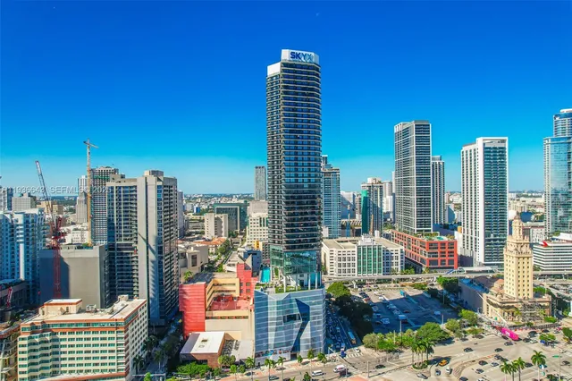 a view of city with tall buildings