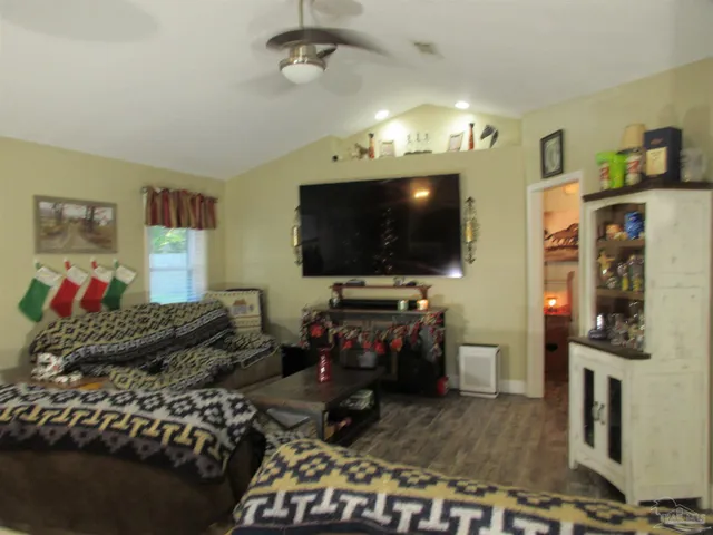 a dining room with a table and chairs