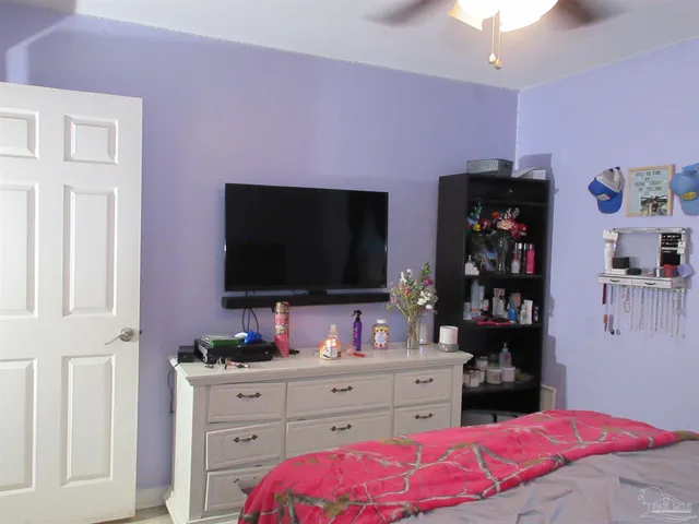 a bathroom with a shower and a sink