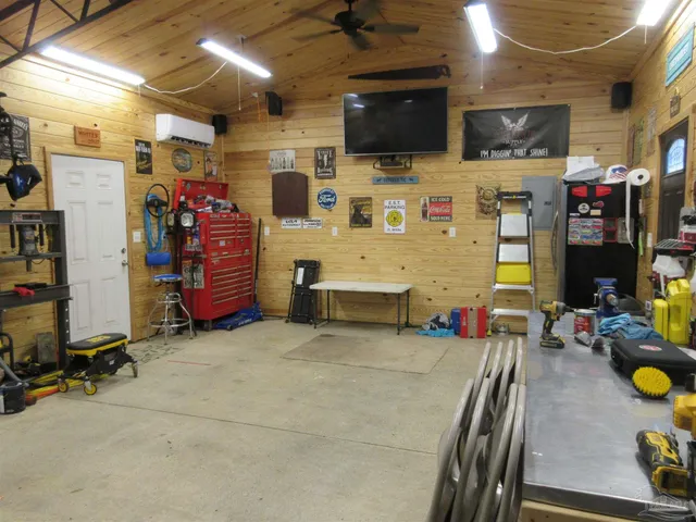 a view of a lake with trees in the background