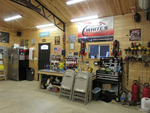 a view of a golf course with a lake view