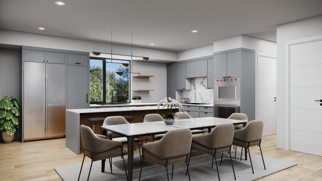 41 University Road, Unit 1 Brookline, MA 02445 - Photo 2 of 6 a dining room with furniture and window