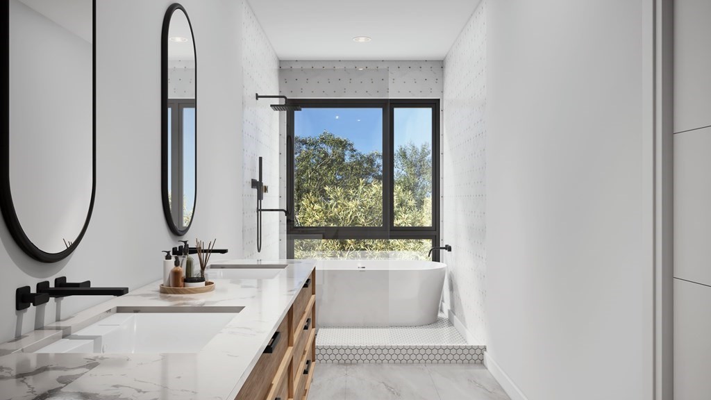 41 University Road, Unit 1 Brookline, MA 02445 - Photo 4 of 6 a bathroom with a sink and a mirror
