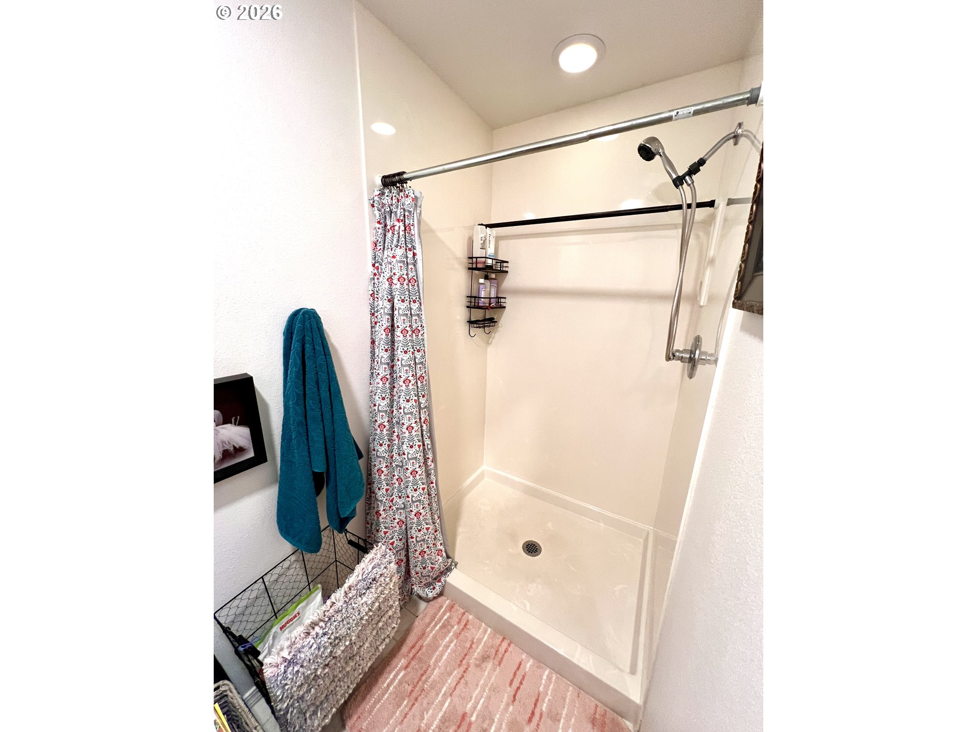 1625 Kristi Loop Lakeside, OR 97449 - Photo 19 of 41 a bathroom with a shower and a toilet