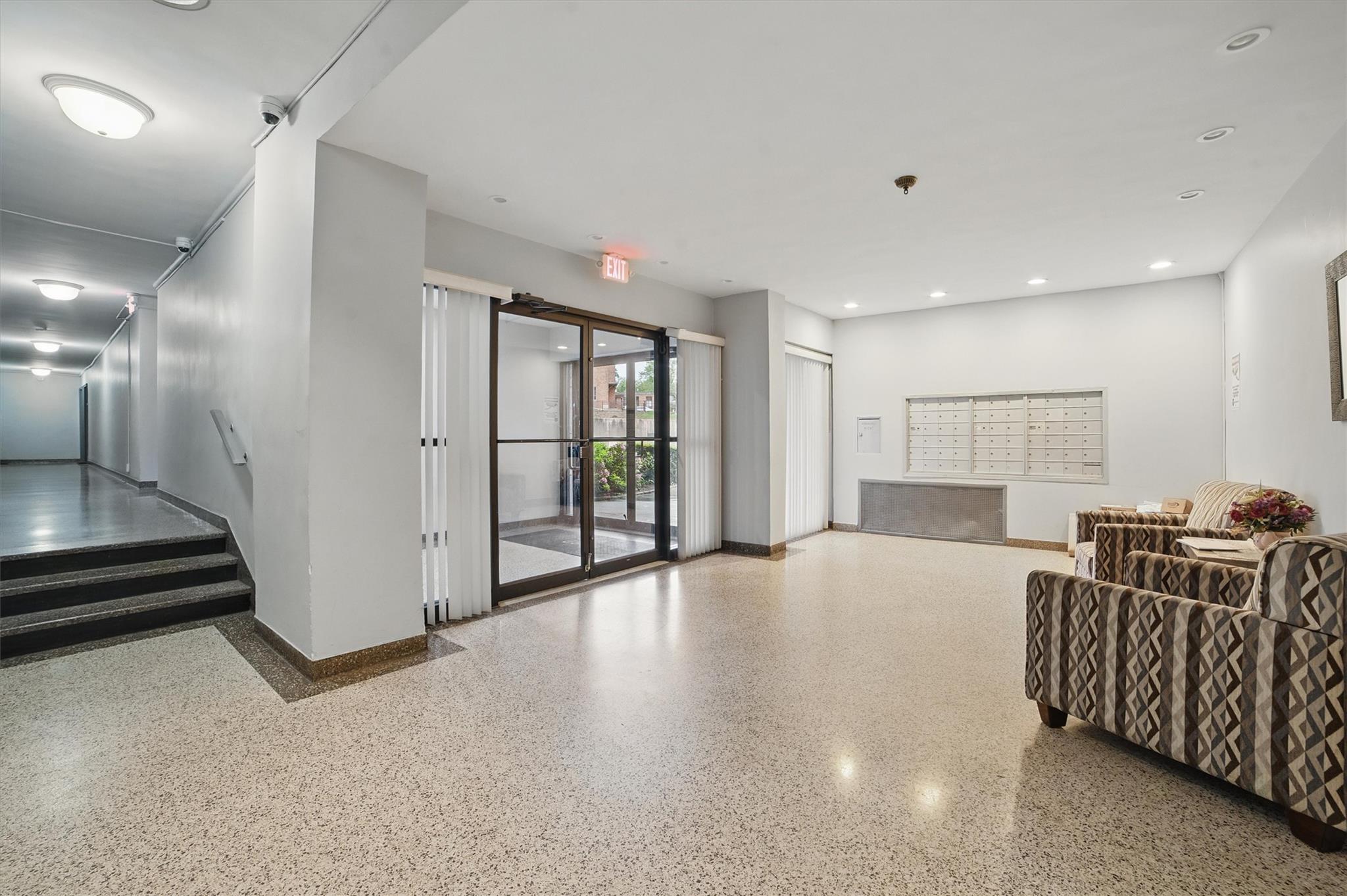 682 Tuckahoe Road, Unit 1A Yonkers, NY 10710 - Photo 3 of 17 a living room with furniture and large window