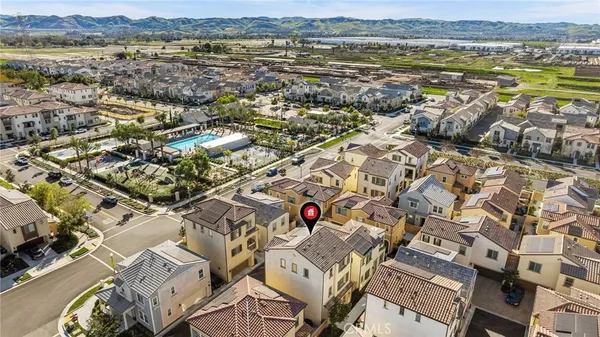 an aerial view of residential building with outdoor space