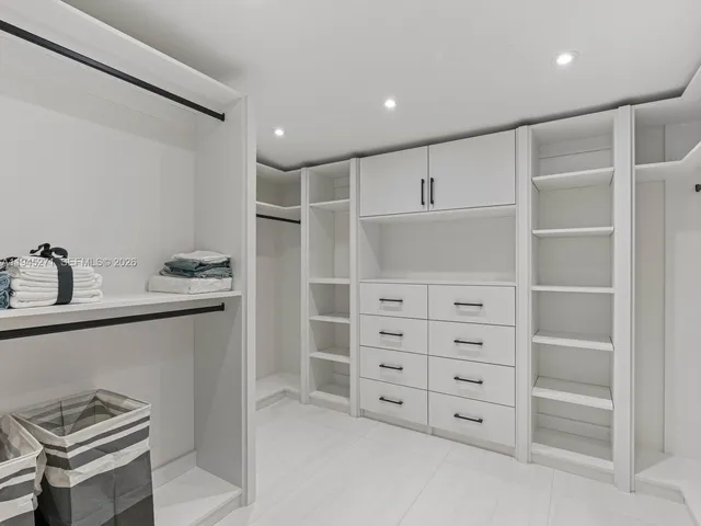 a view of an empty walk in closet