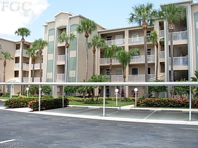 14081 Brant Point Circle, Unit 537 Fort Myers, FL 33919 - Photo 1 of 23 front view of building with a street