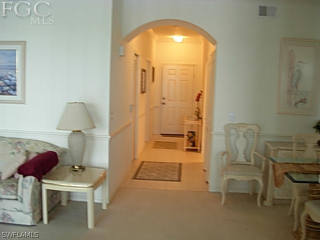 14081 Brant Point Circle, Unit 537 Fort Myers, FL 33919 - Photo 13 of 23 a room with a table and a chair