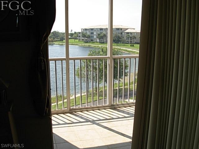 14081 Brant Point Circle, Unit 537 Fort Myers, FL 33919 - Photo 18 of 23 a view of backyard from window