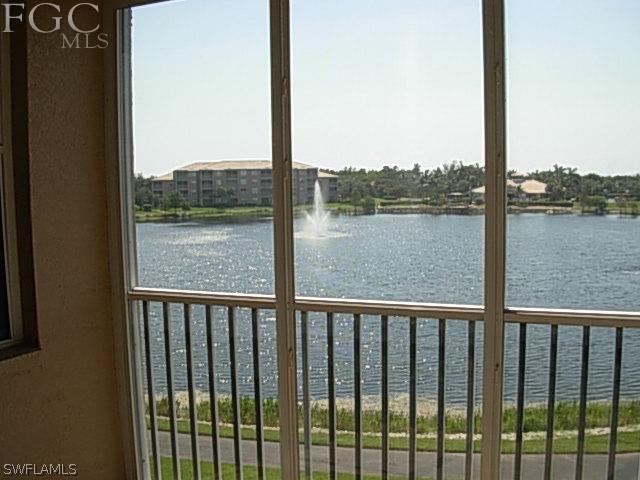 14081 Brant Point Circle, Unit 537 Fort Myers, FL 33919 - Photo 21 of 23 a view of a lake from a window