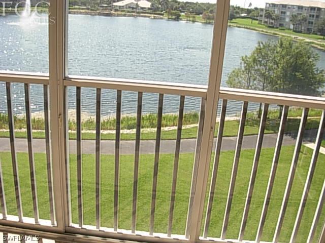 14081 Brant Point Circle, Unit 537 Fort Myers, FL 33919 - Photo 22 of 23 a view of a glass door with lake view