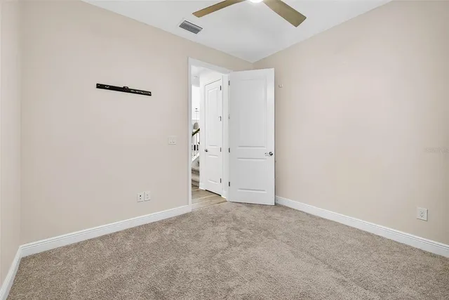 a view of an empty walk in closet