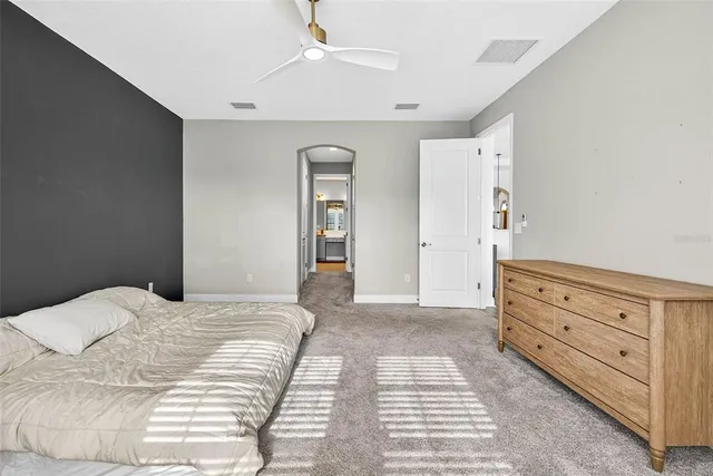 a bathroom with a sink toilet tub and shower