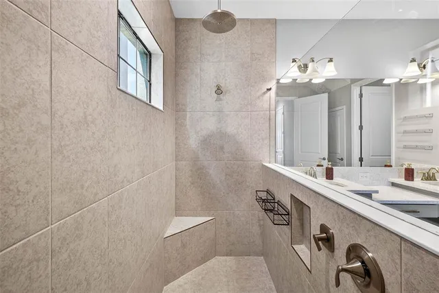 a view of a swimming pool with a table and chairs