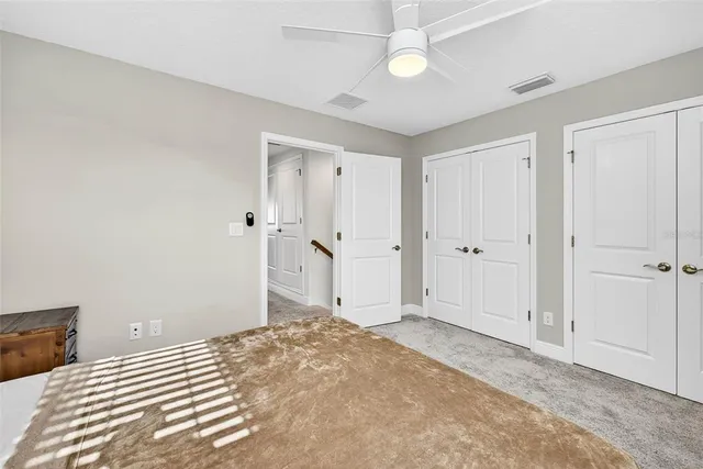 a view of a swimming pool and an outdoor space