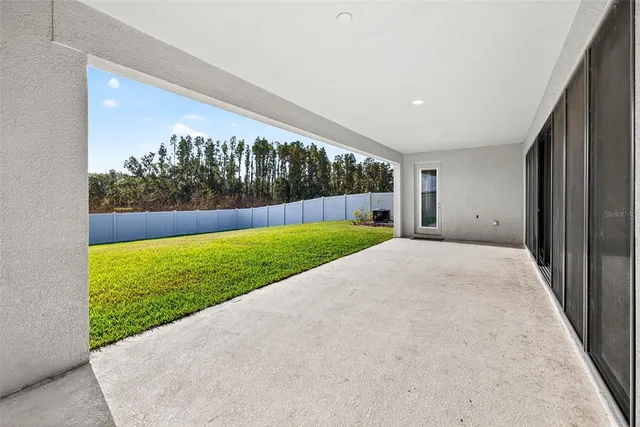 a view of a swimming pool with an ocean view