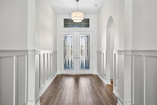 a kitchen with stainless steel appliances granite countertop a sink and cabinets