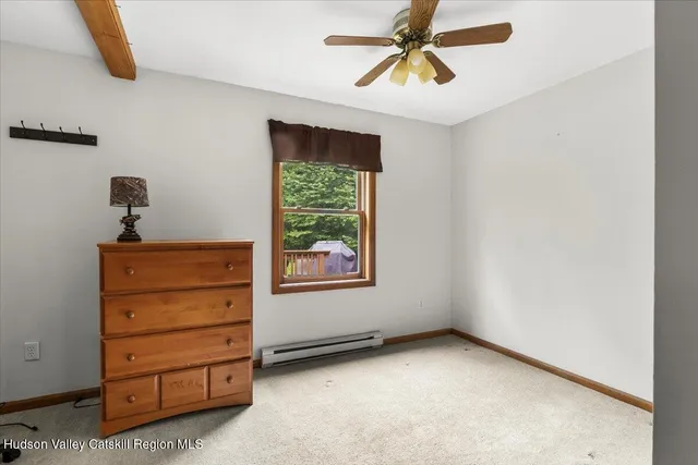 a view of a house with a yard patio and sitting area