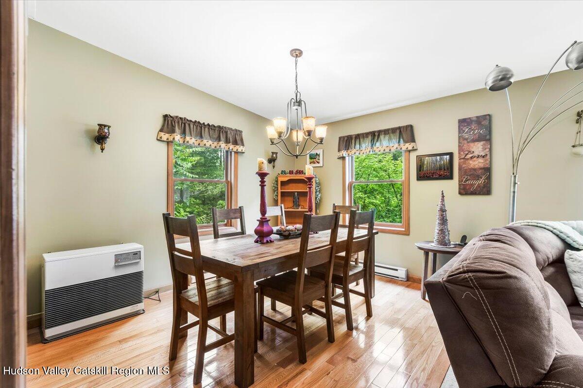 61 Travis Boulevard Catskill, NY 12414 - Photo 7 of 30 a view of a dining room with furniture window and outside view