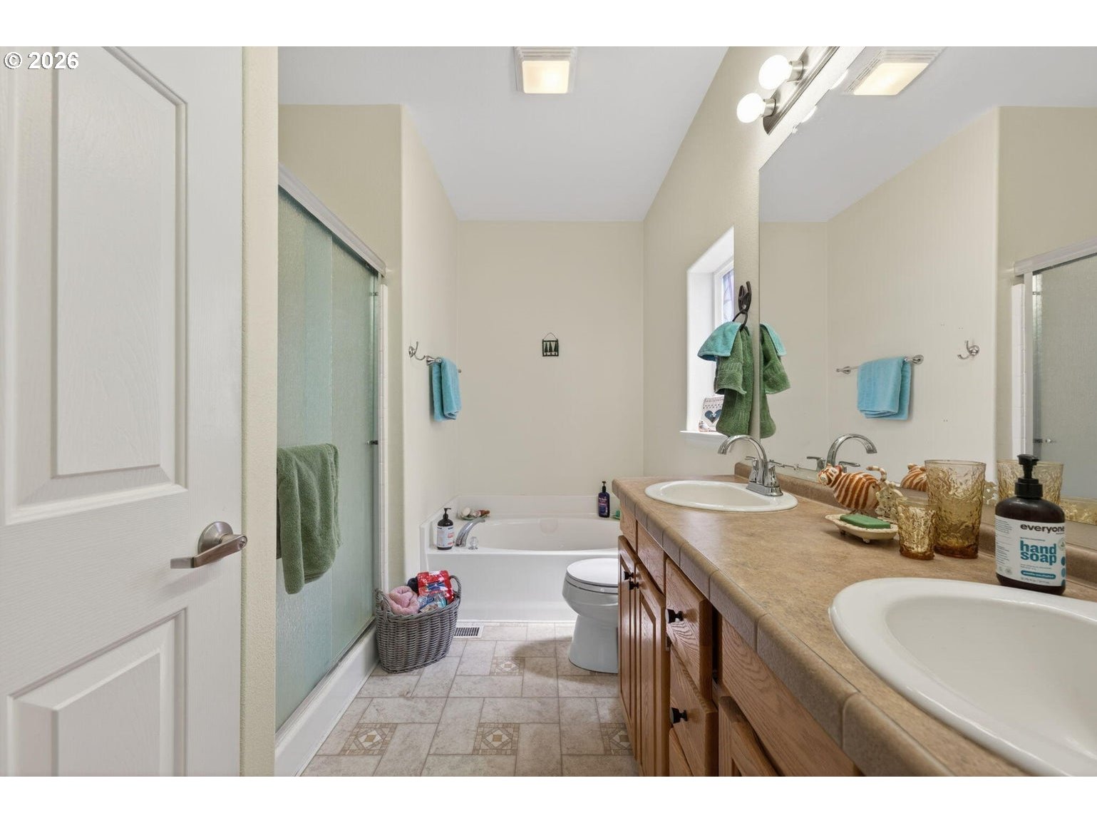 538 North Tam Rim Drive Sisters, OR 97759 - Photo 21 of 45 a bathroom with a granite countertop sink a mirror and a shower