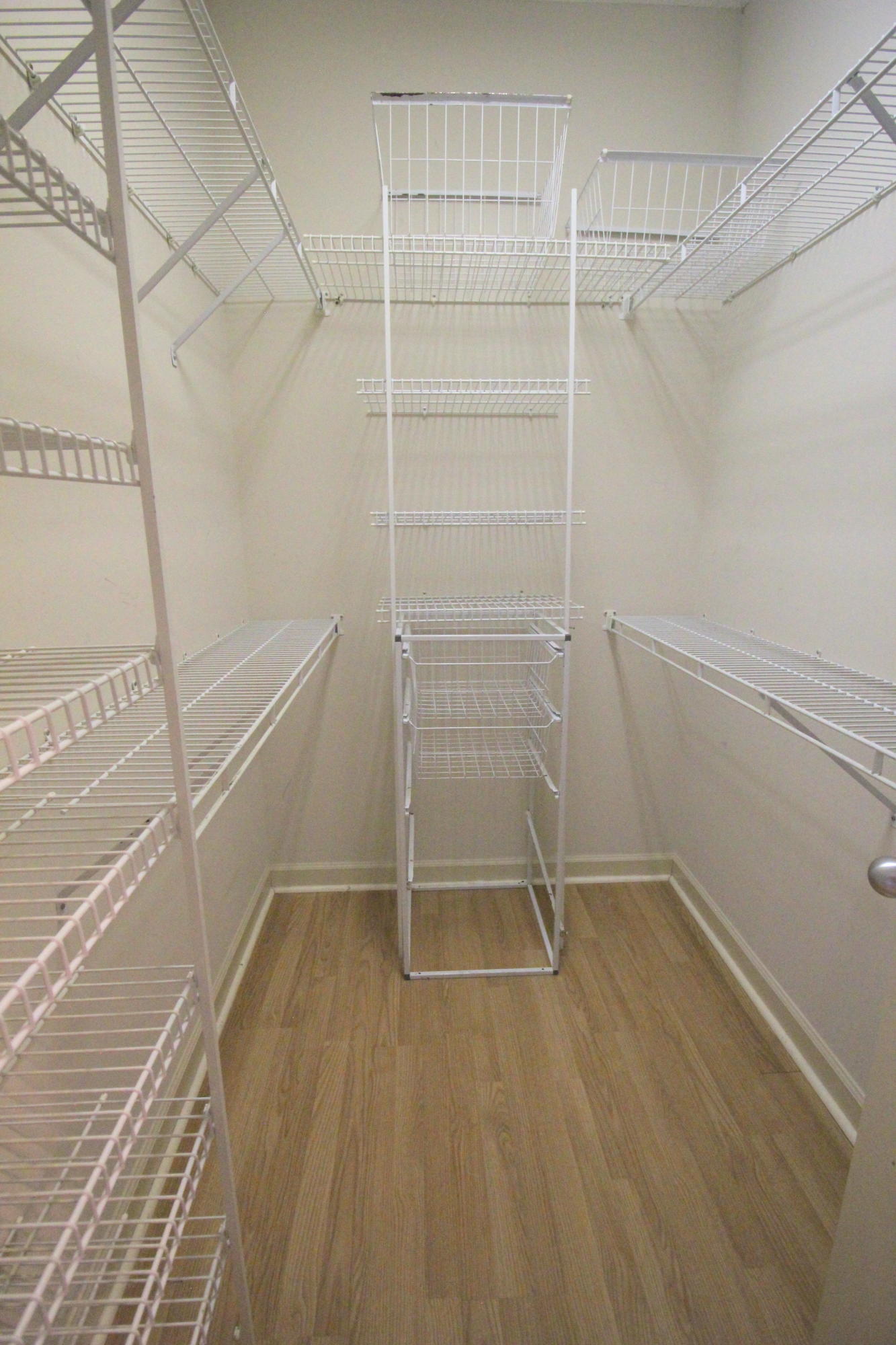 23475 Water Circle Boca Raton, FL 33486 - Photo 22 of 32 a view of walk in closet with empty racks