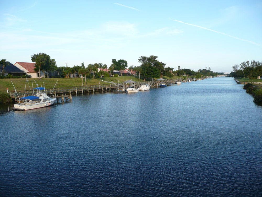 23475 Water Circle Boca Raton, FL 33486 - Photo 31 of 32 a view of a lake with houses