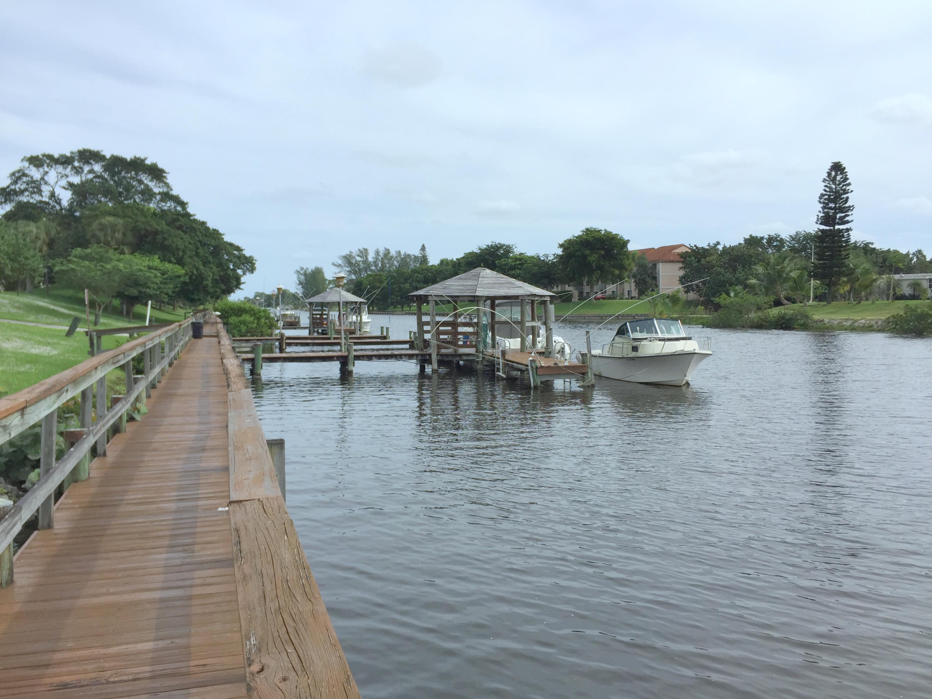 23475 Water Circle Boca Raton, FL 33486 - Photo 32 of 32 a view of houses with outdoor space