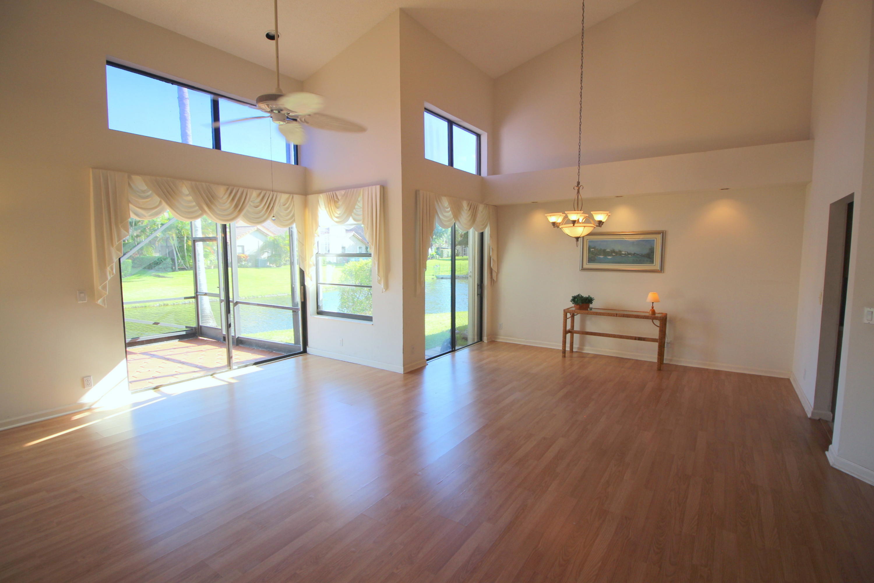 23475 Water Circle Boca Raton, FL 33486 - Photo 7 of 32 a view of an entryway with wooden floor