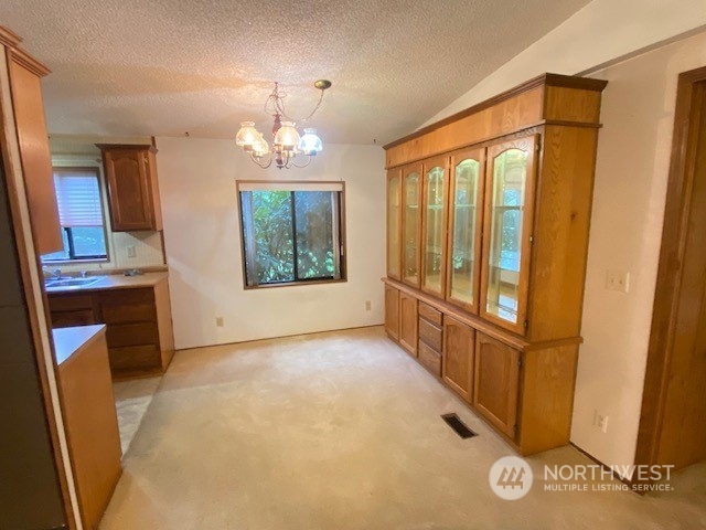 160 Jeffries Road Chehalis, WA 98532 - Photo 7 of 20 wooden floor in an empty room with a window