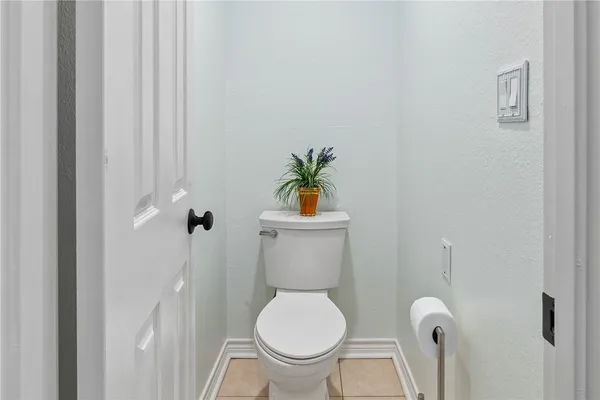 a bathroom with a toilet and a sink