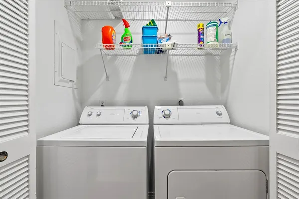 a utility room with dryer and washer