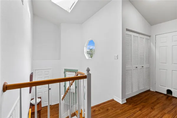 a view of front door with wooden floor
