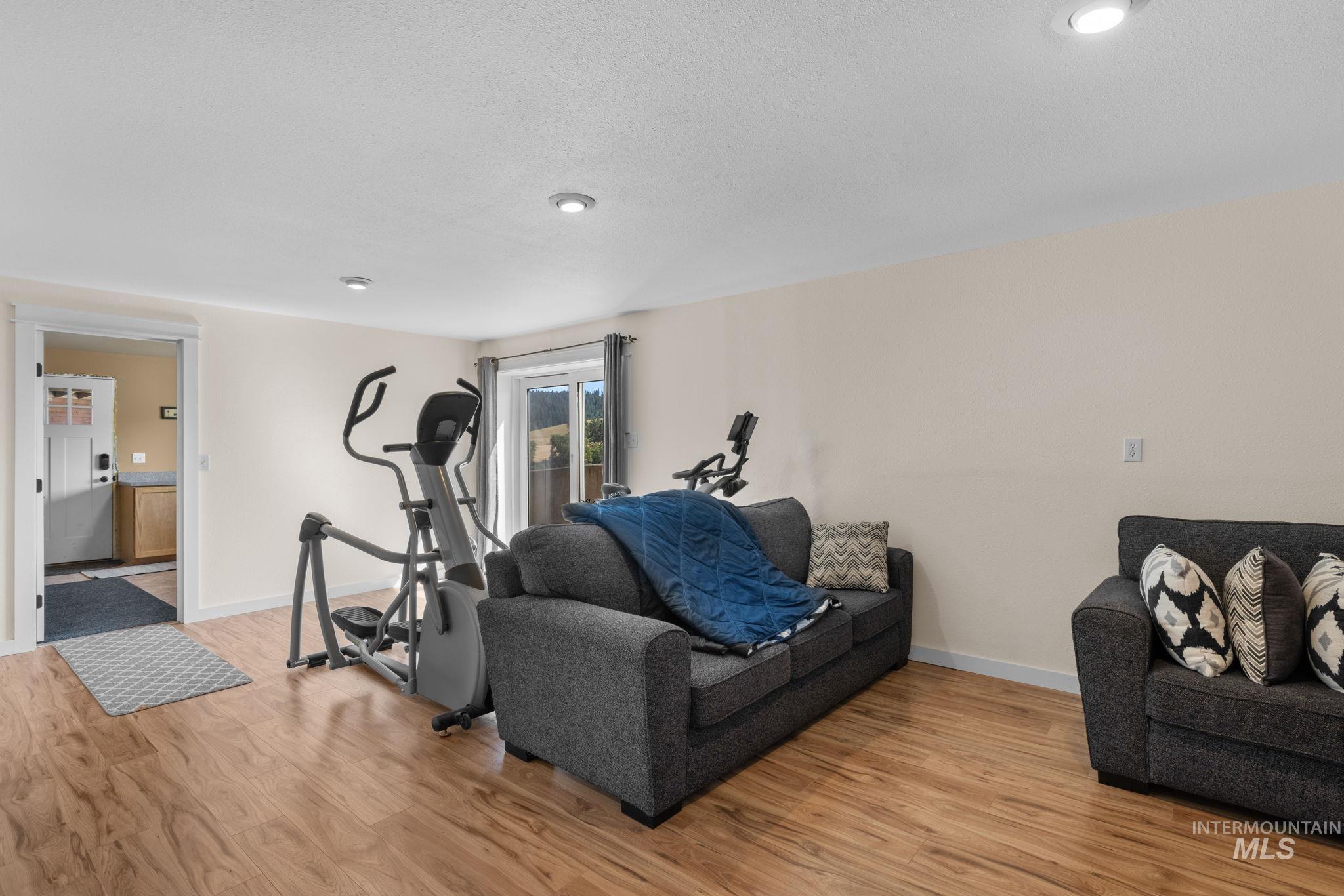 1199 Walker Road Viola, ID 83872 - Photo 24 of 50 Exercise area featuring light wood-style floors and recessed lighting